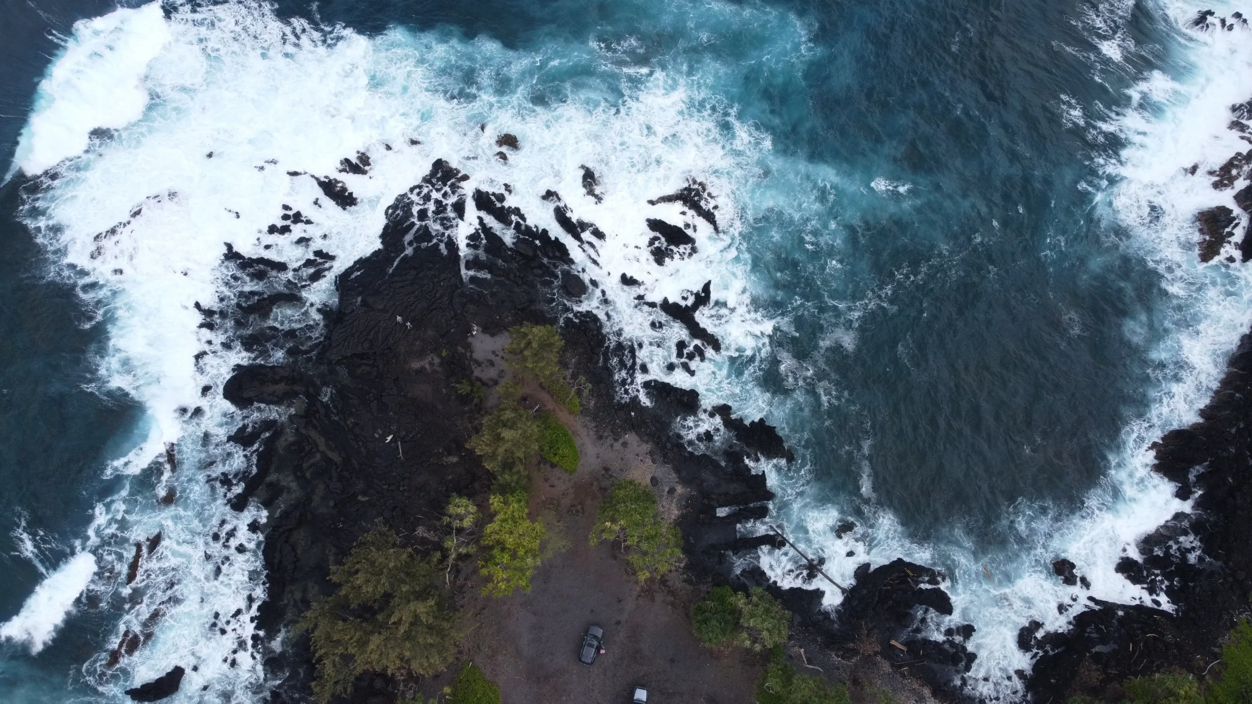 adventures on maui - "aerial view of waves crashing on a rocky shore" by Jashith G, via Pexels